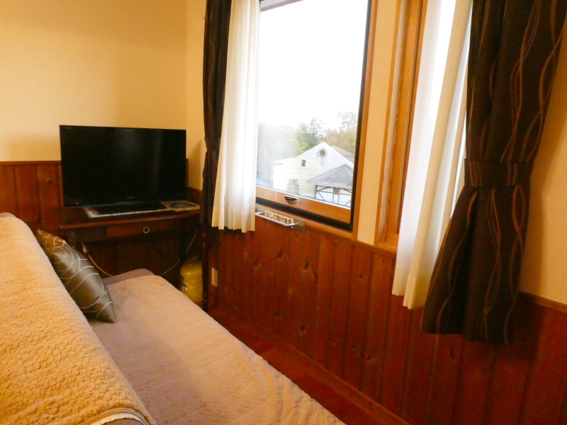 伊豆高原オーベルジュミヨーの寝室のソファー